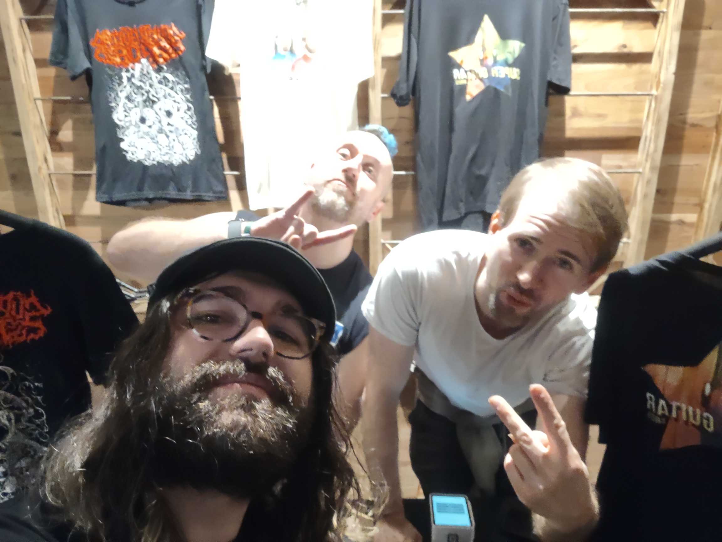 a selfie containing me and the super guitar bros behind me.